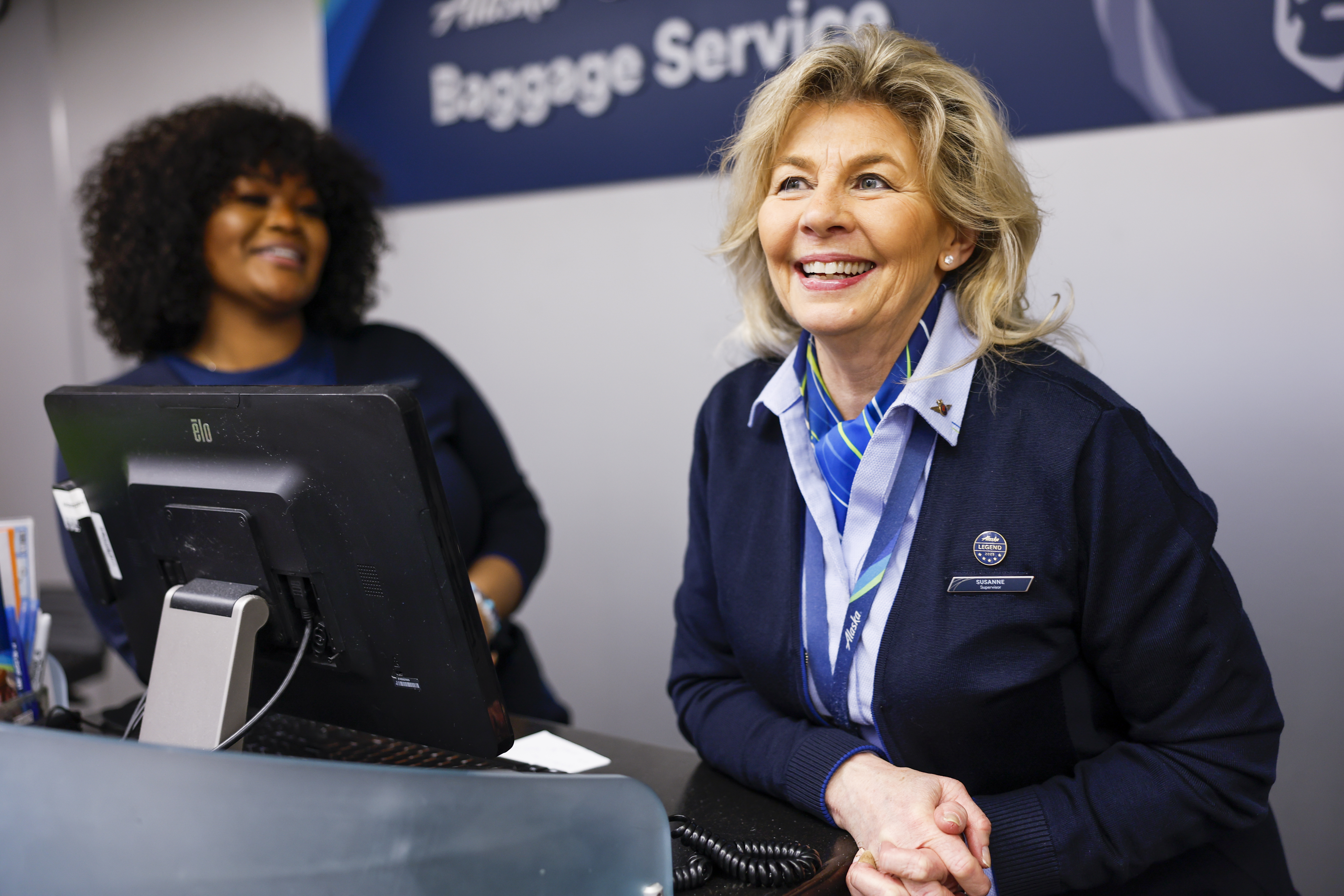 HA Guest Service Agent assisting a customer