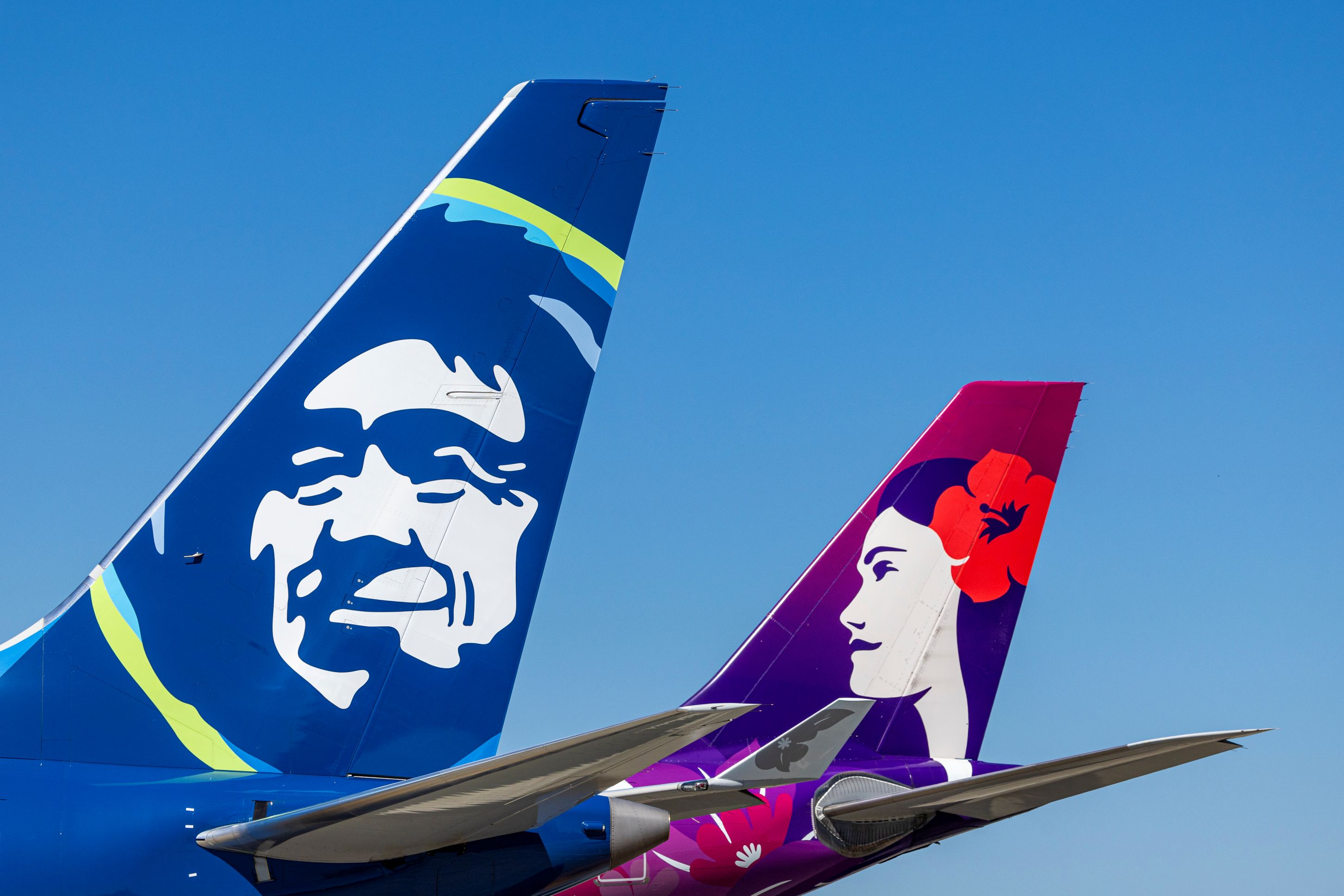 Hawaiian Airlines and Alaska Airlines tails