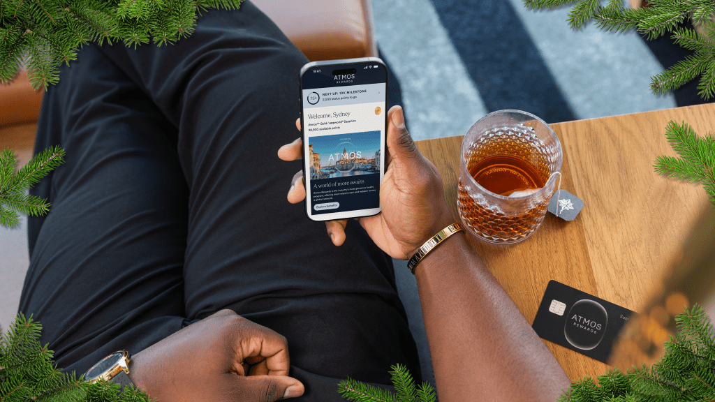 Atmos member on their phone