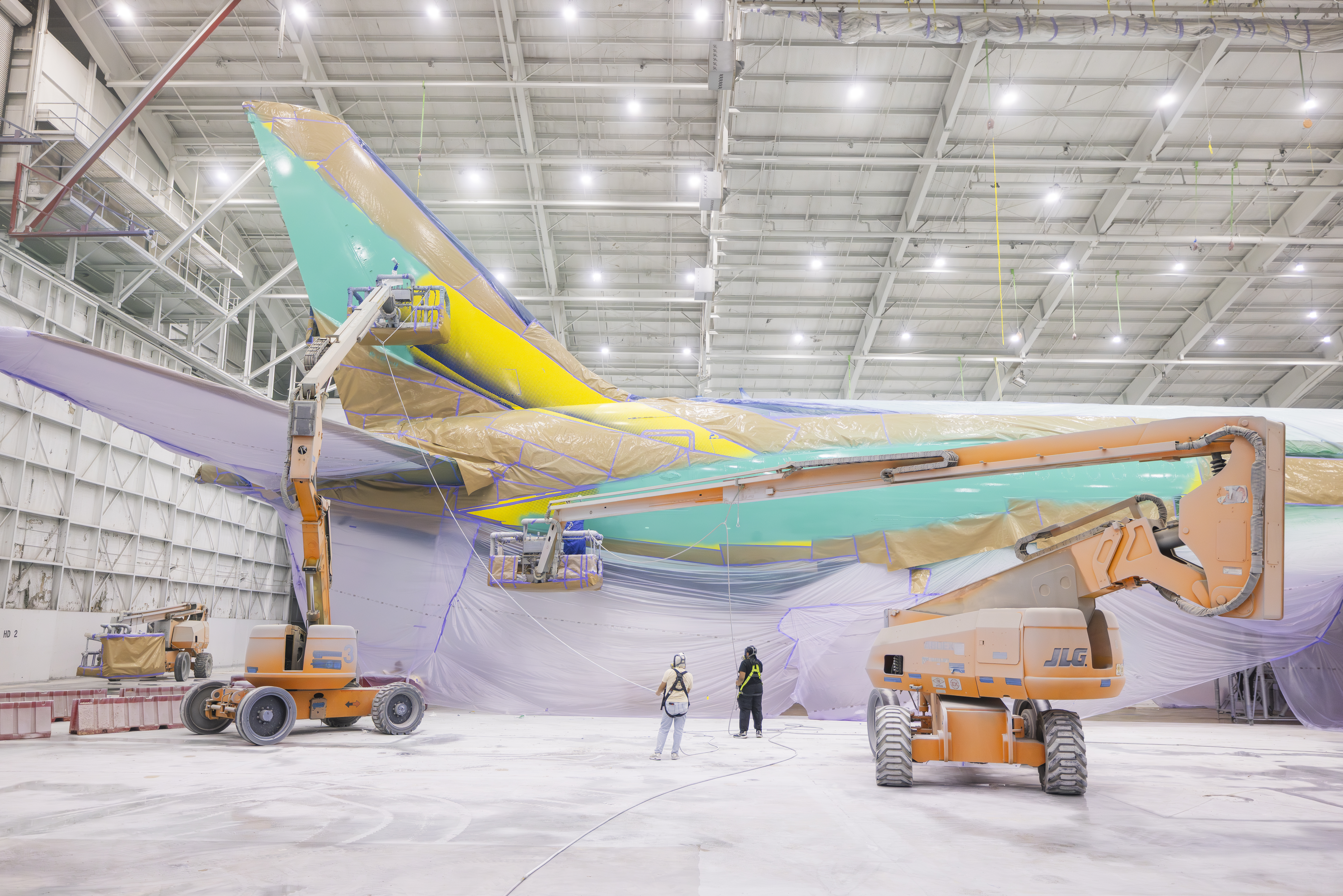 Alaska Airlines global livery being painted