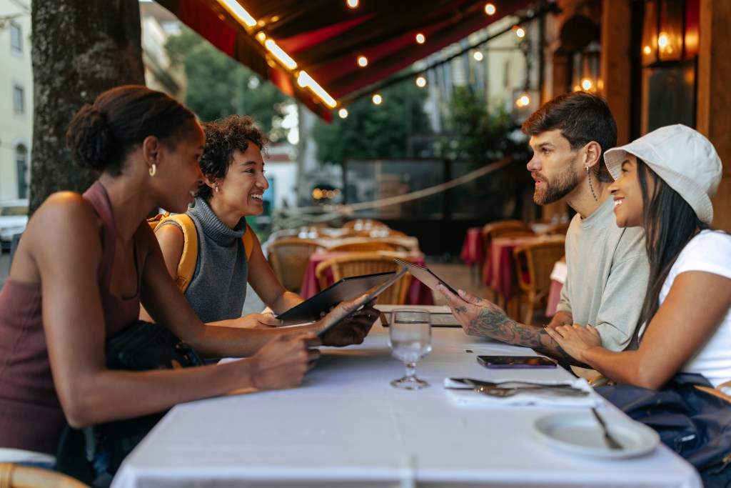 Friends in Rome having dinner