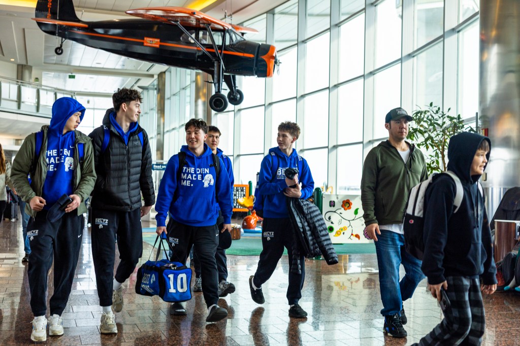 Nome athletes at the airport