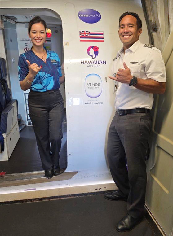 crew at door with oneworld decal