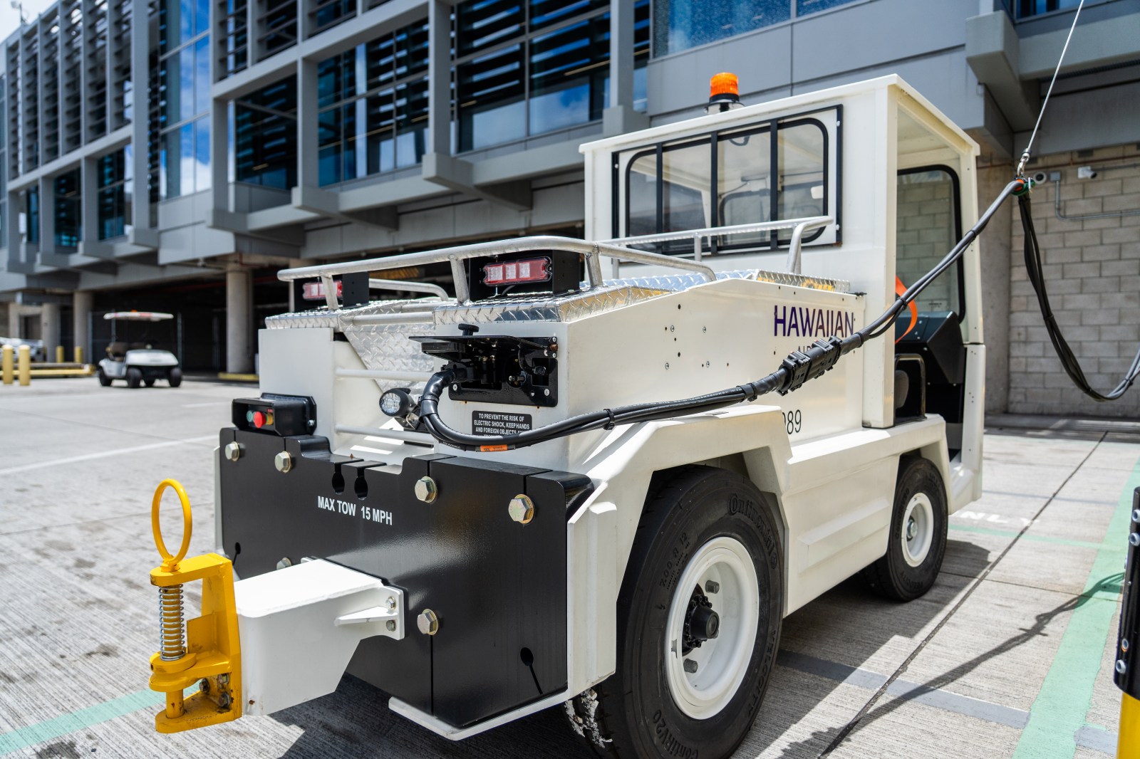 Close-up of one of Hawaiian Airlines' new electric ground support tractors at HNL