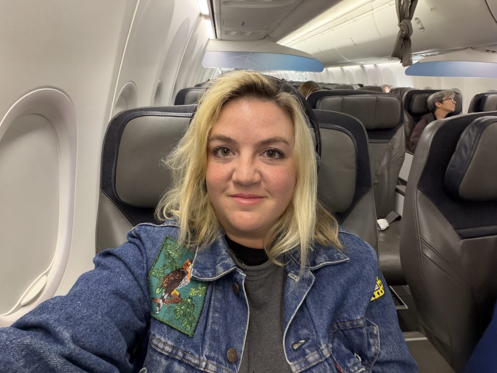 Ali in her seat onboard Alaska