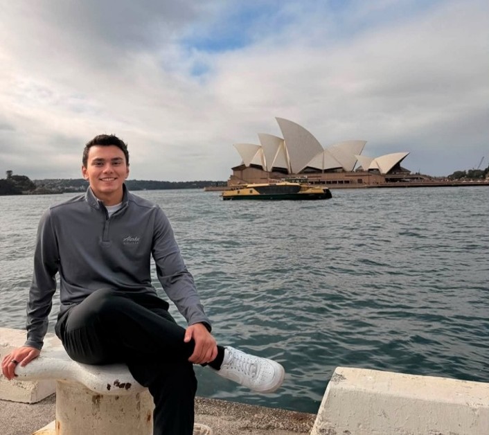 Intern sitting outside of the Sydney Opera House