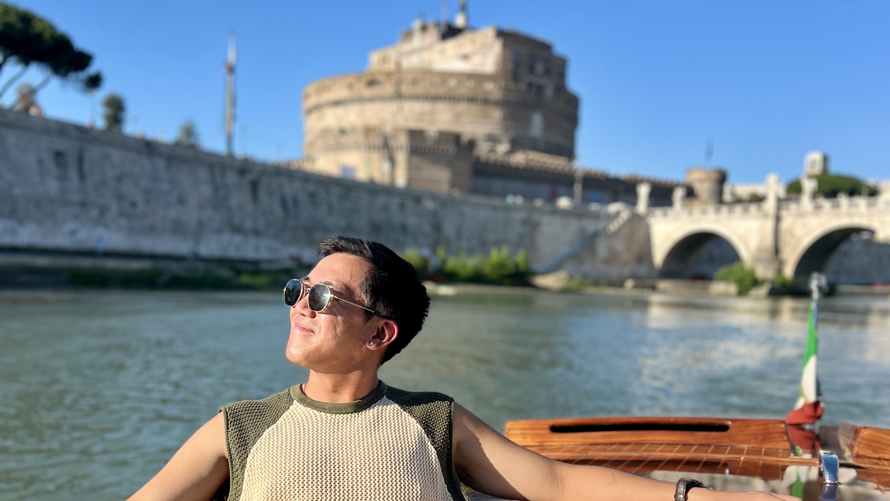 Chris Dong on a boat in Rome