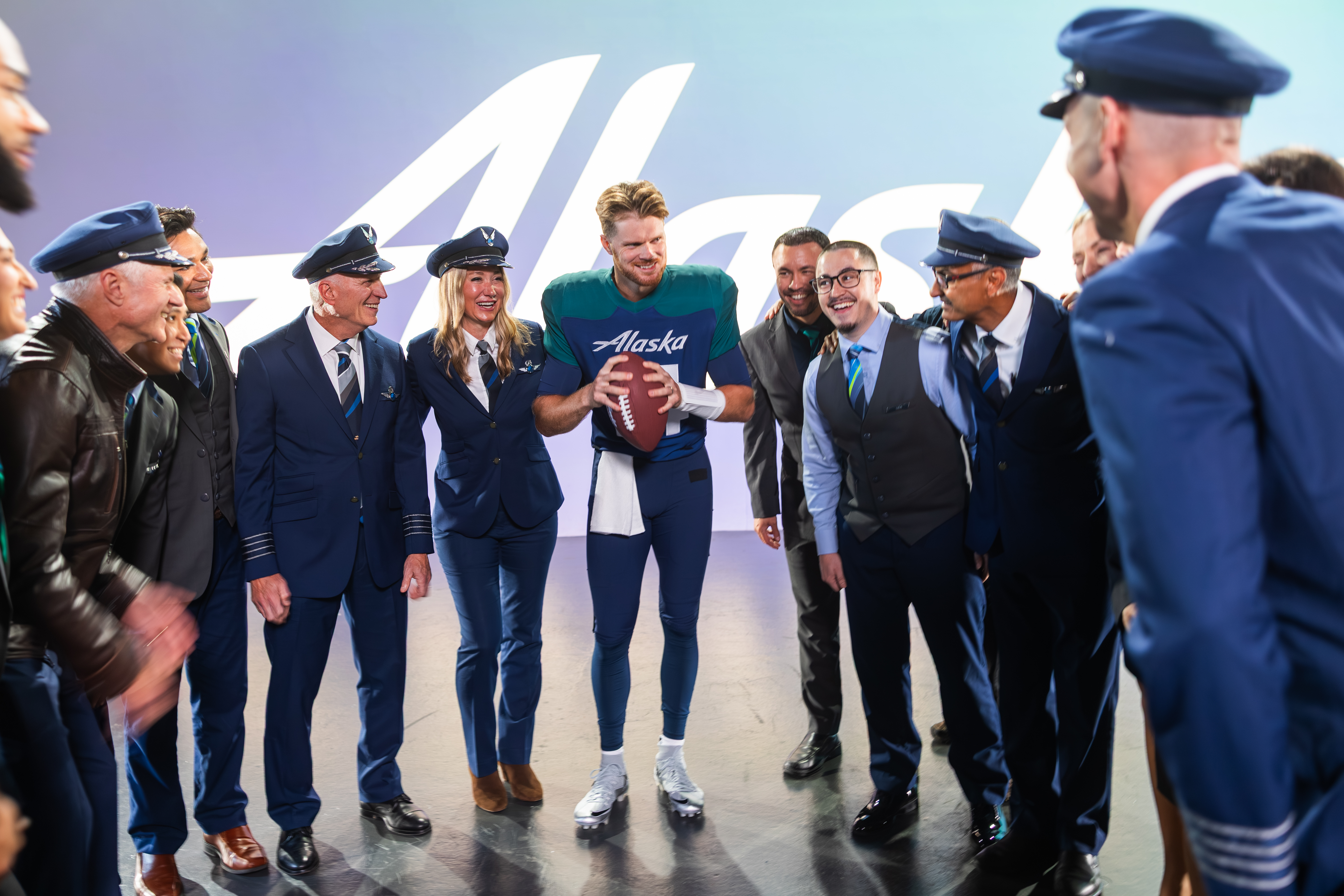 Sam Darnold with Alaska crew