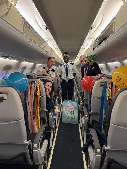 Jen and the crew in the aircraft