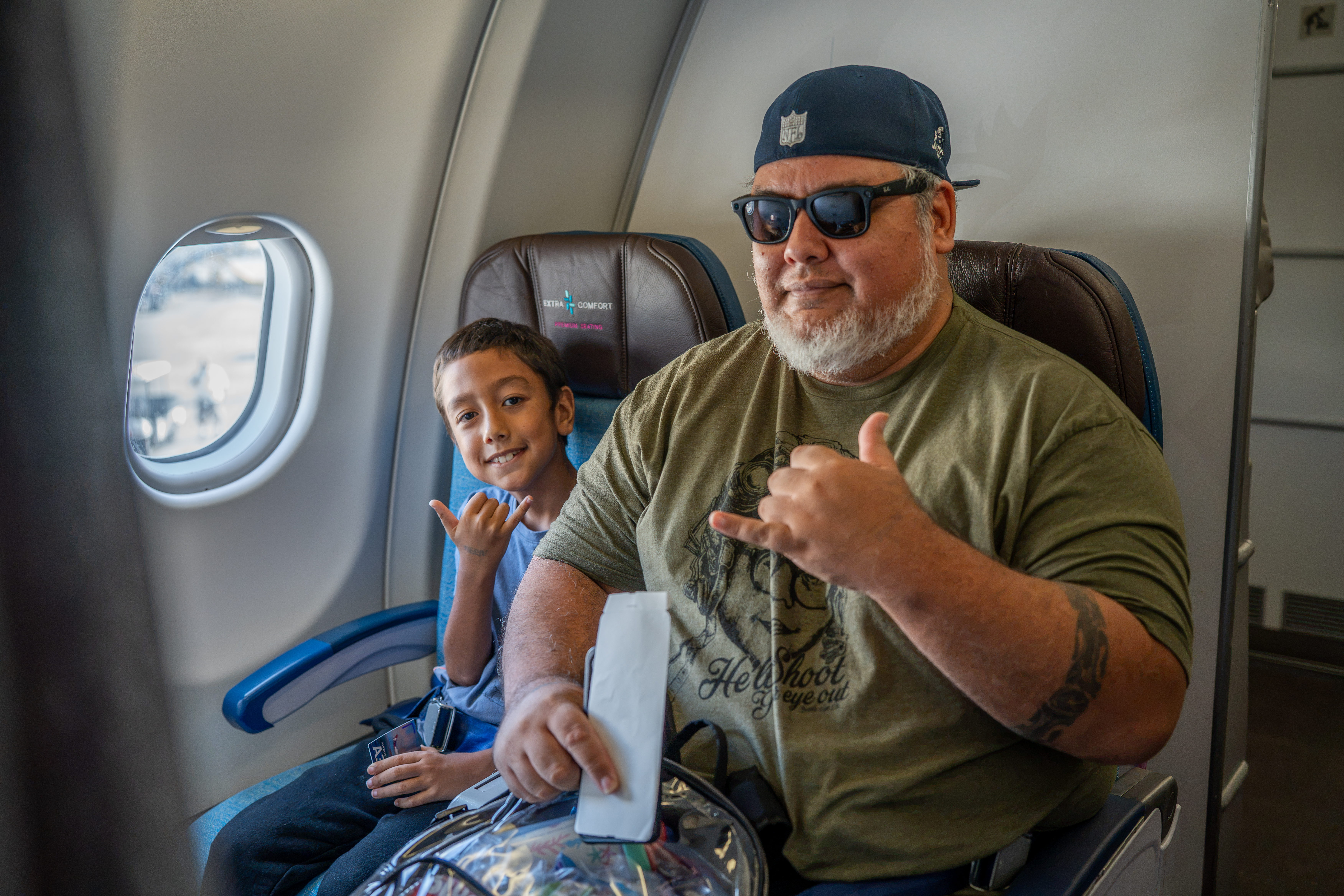 Son and father on the plane