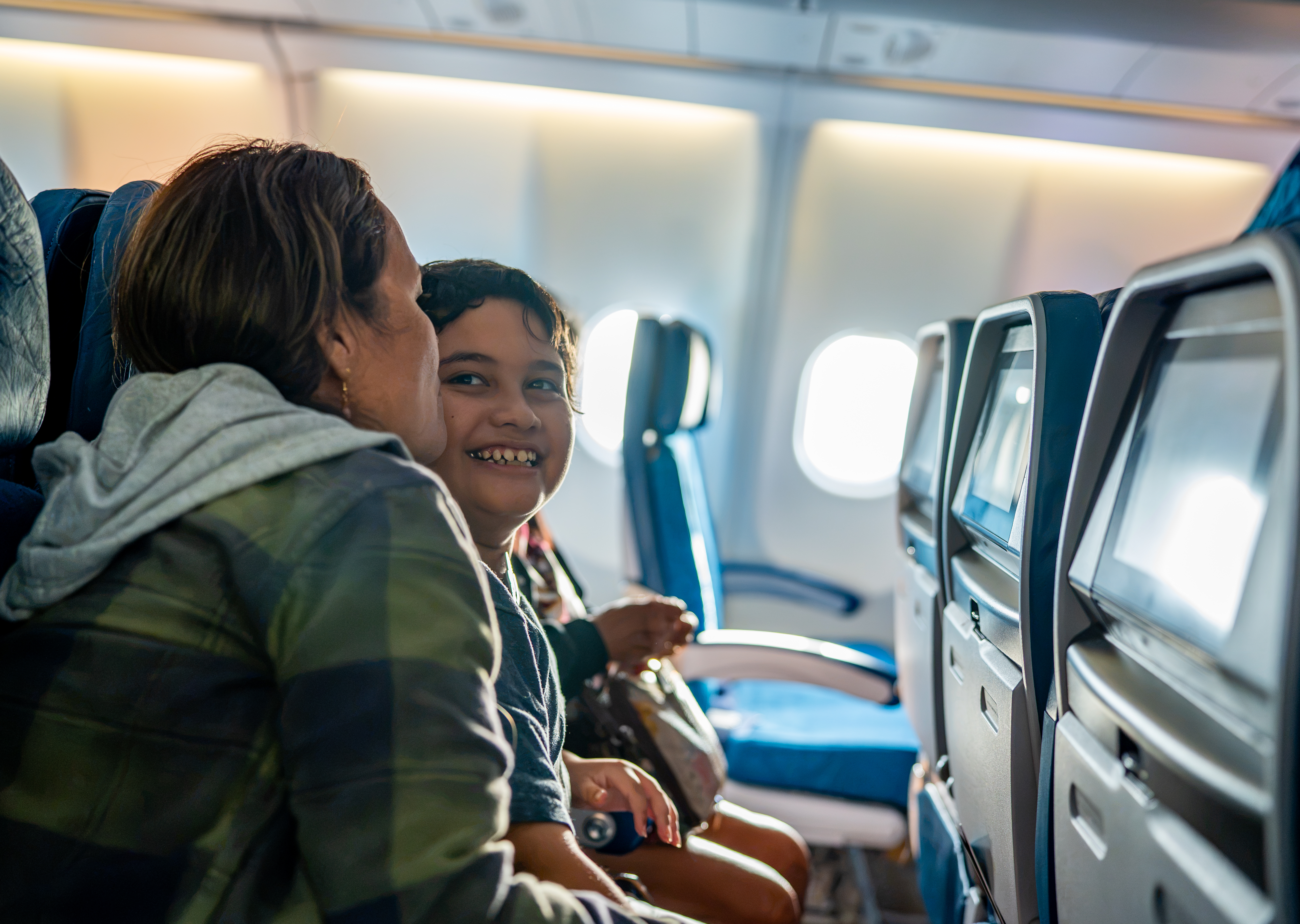 Parent and child on flight